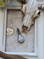 Rainbow Moonstone Wrapped in Silver