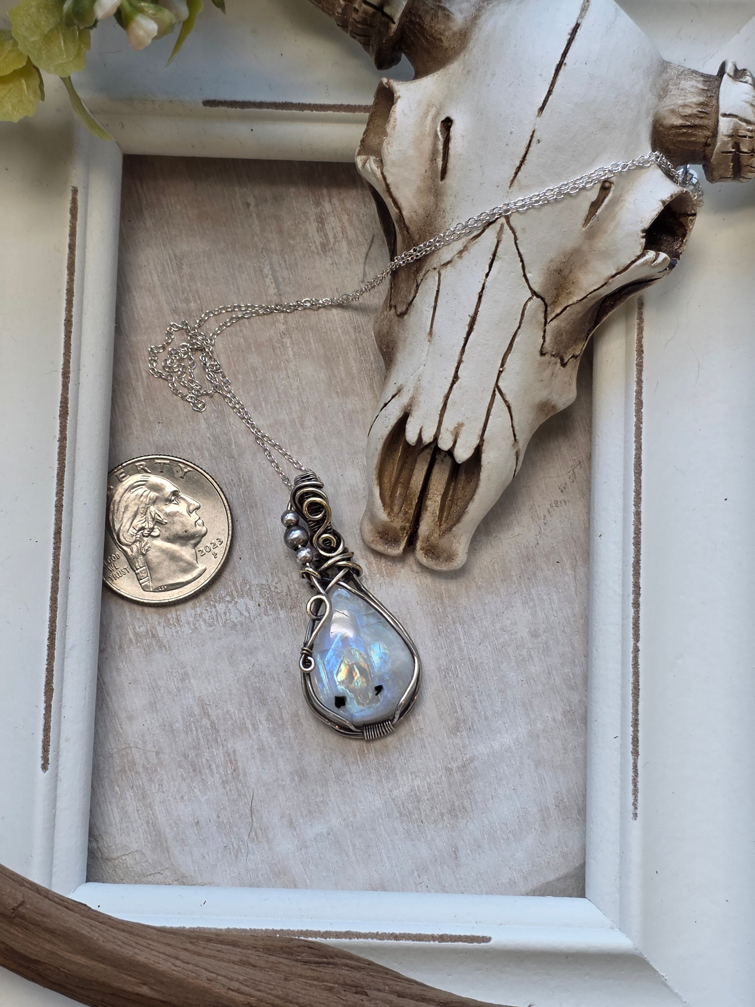 Rainbow Moonstone Wrapped in Silver