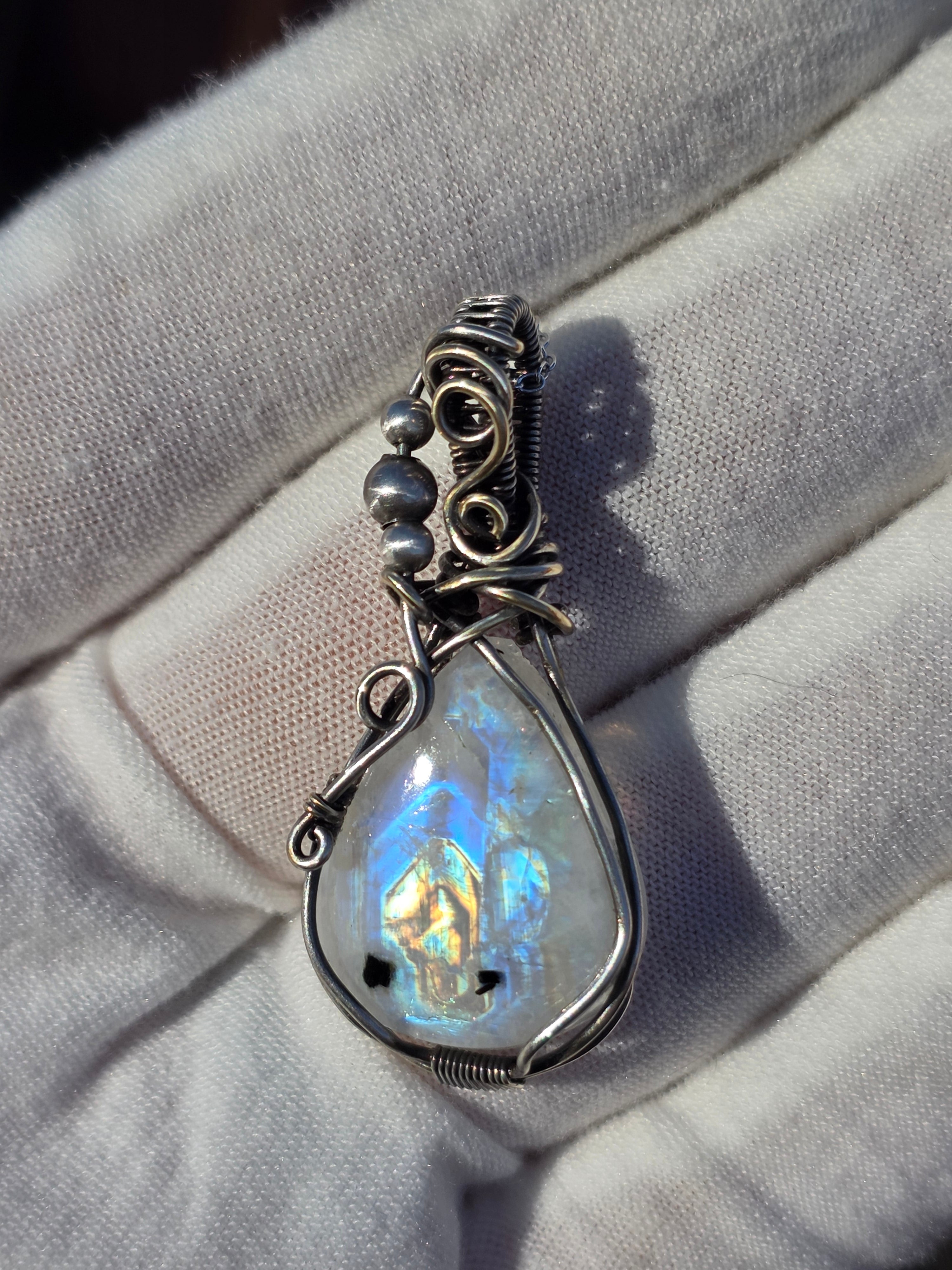 Rainbow Moonstone Wrapped in Silver