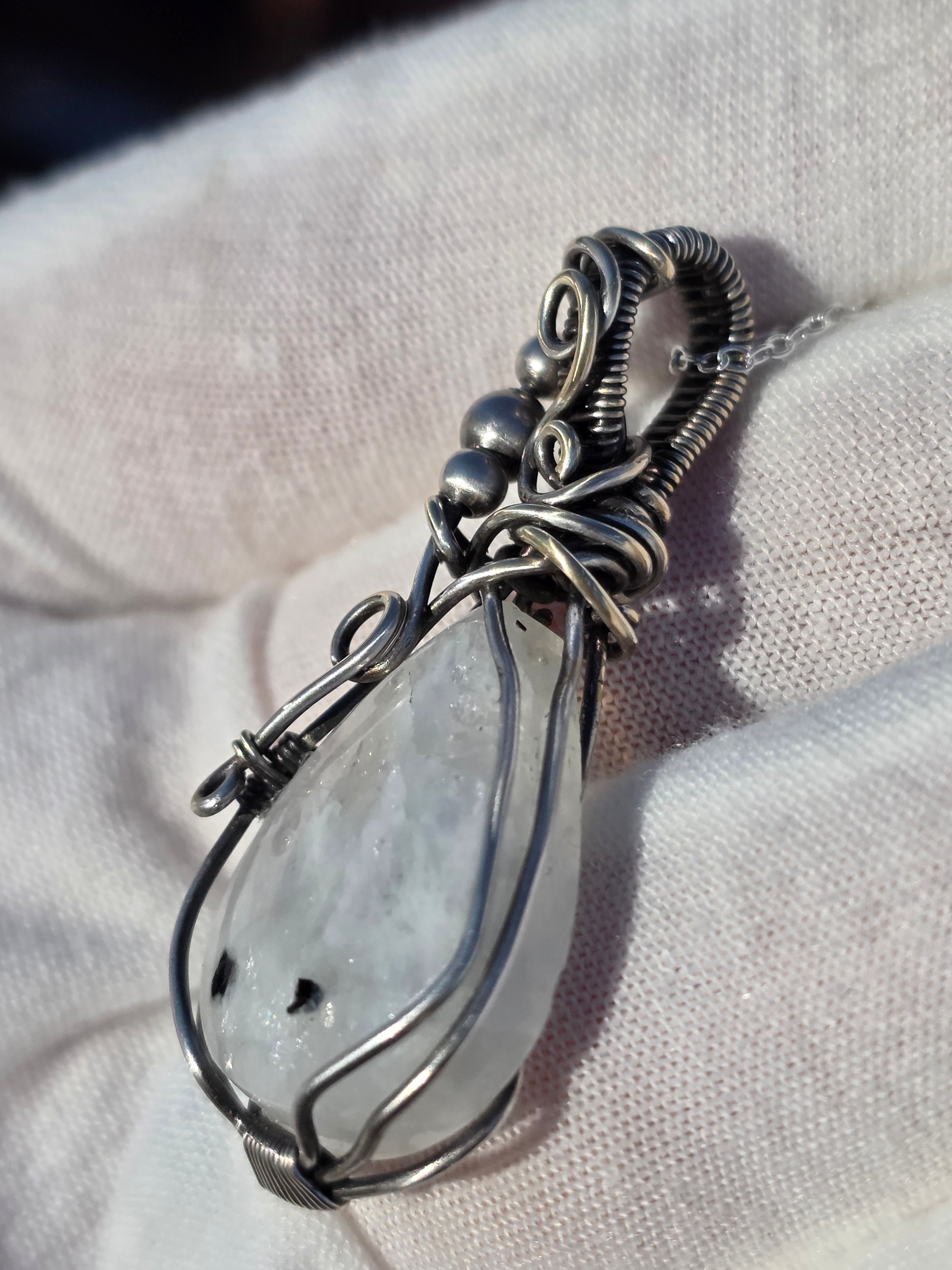Rainbow Moonstone Wrapped in Silver