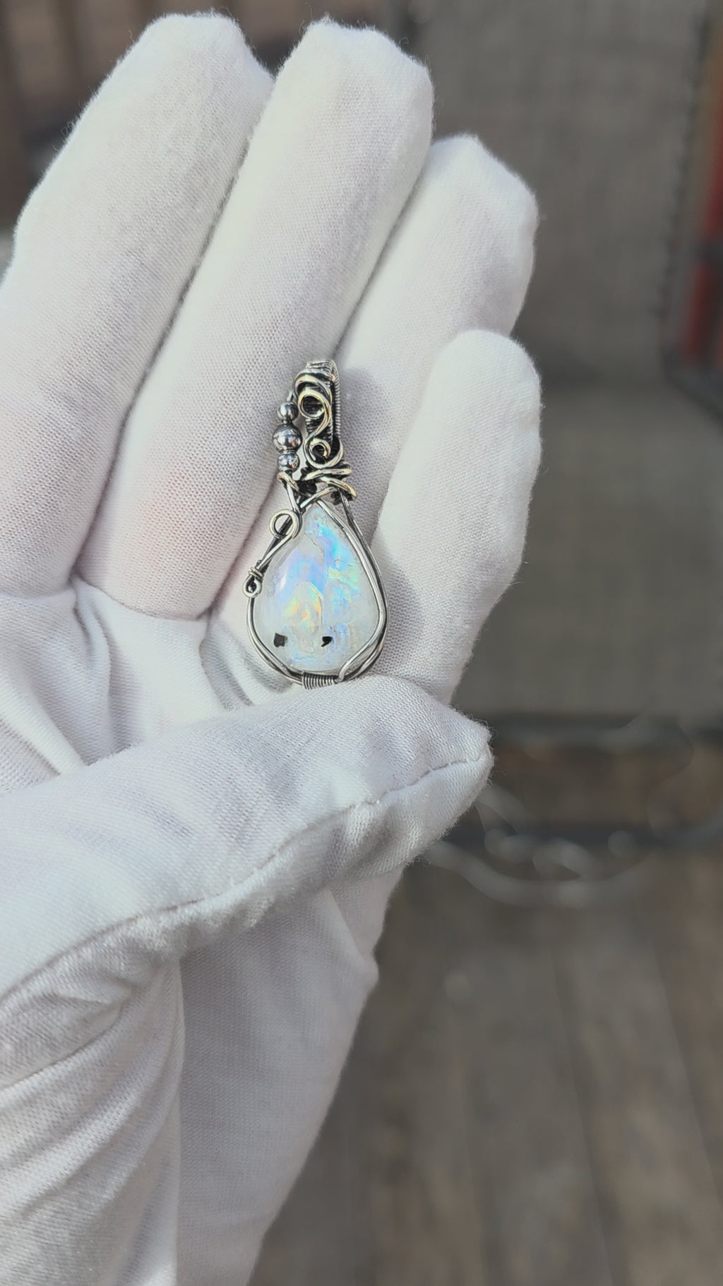 Rainbow Moonstone Wrapped in Silver