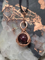 "Orbit" Garnet Pendant