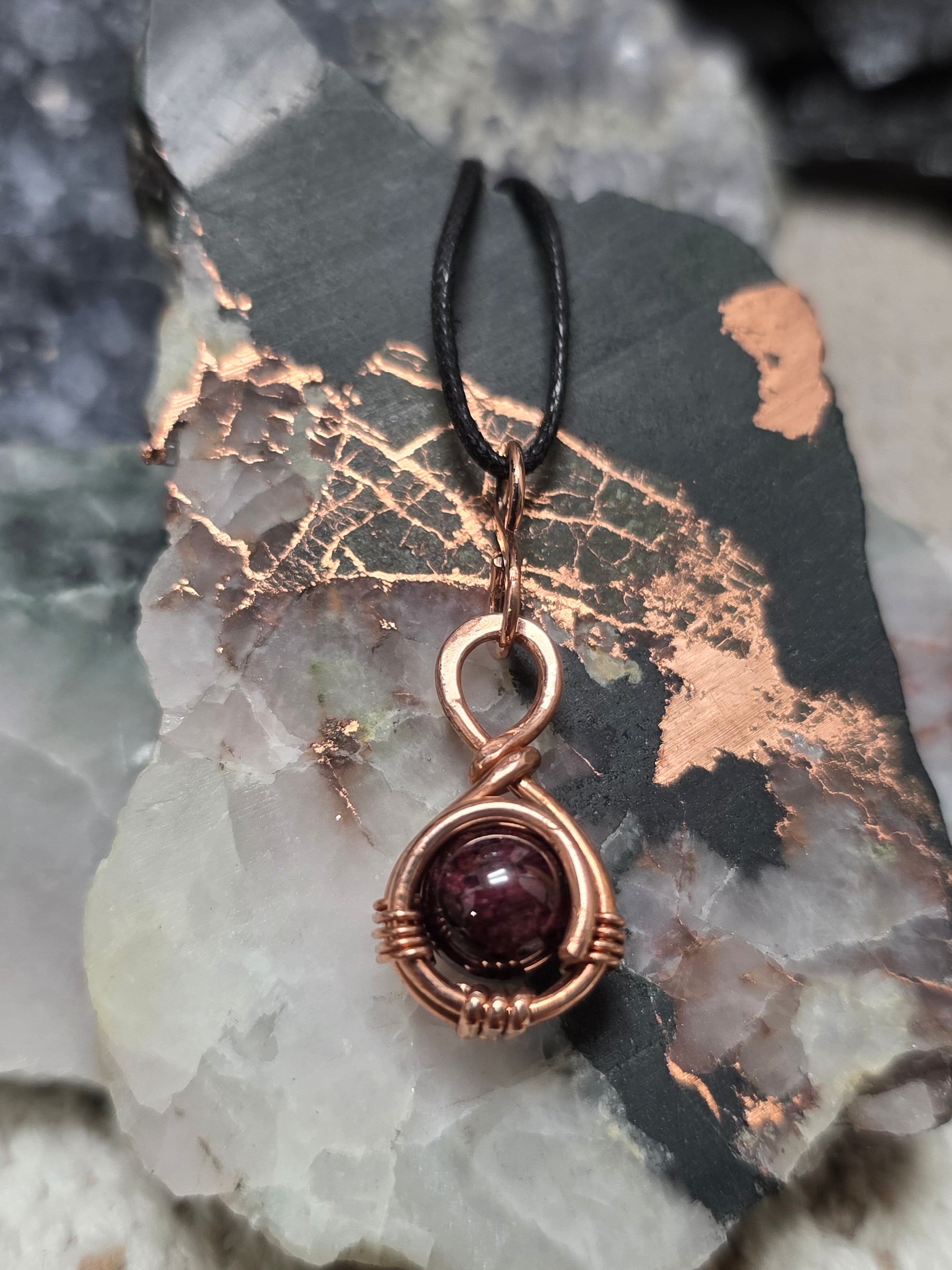 "Orbit" Garnet Pendant