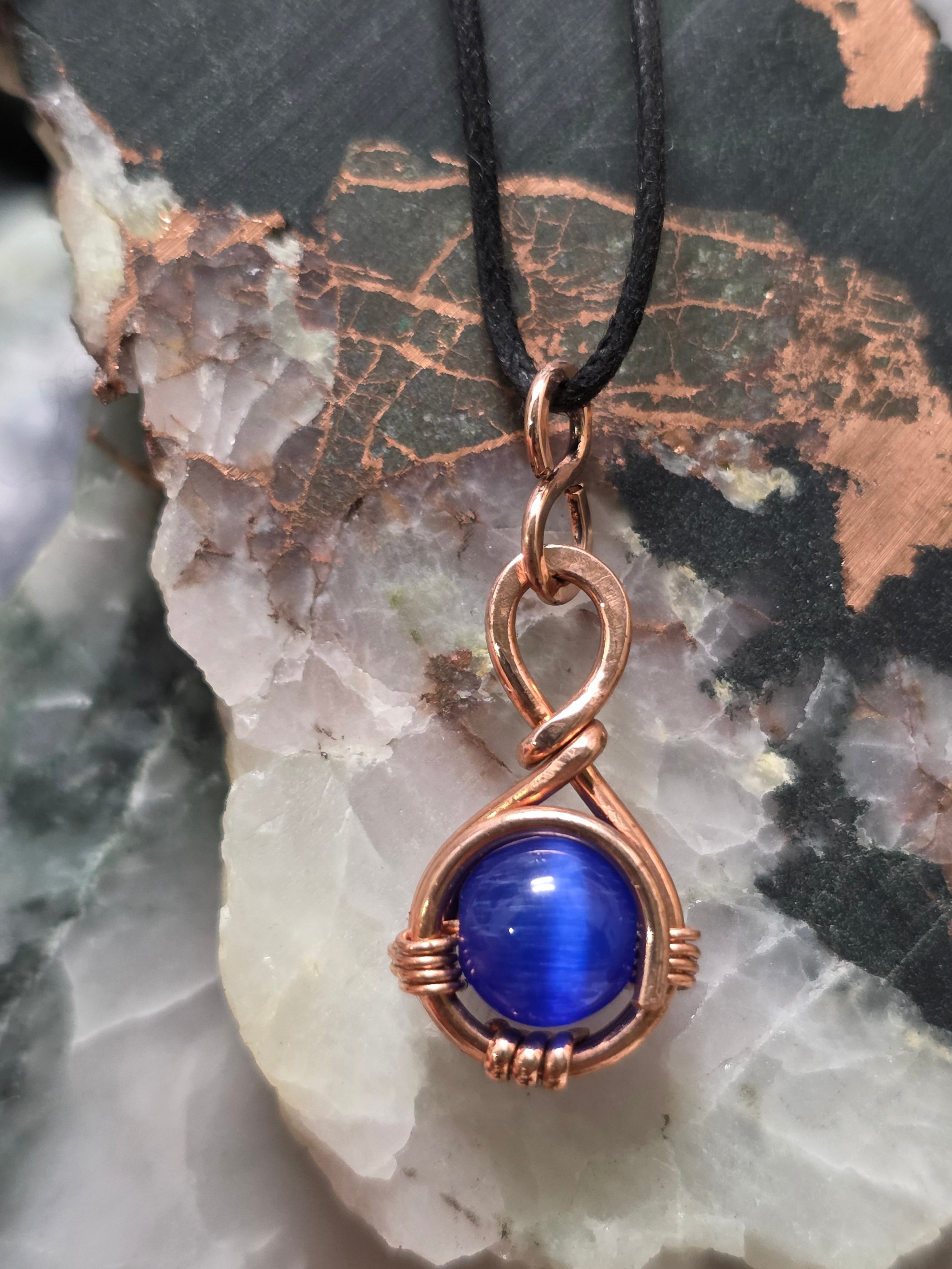 "Orbit" Blue Cats Eye Pendant