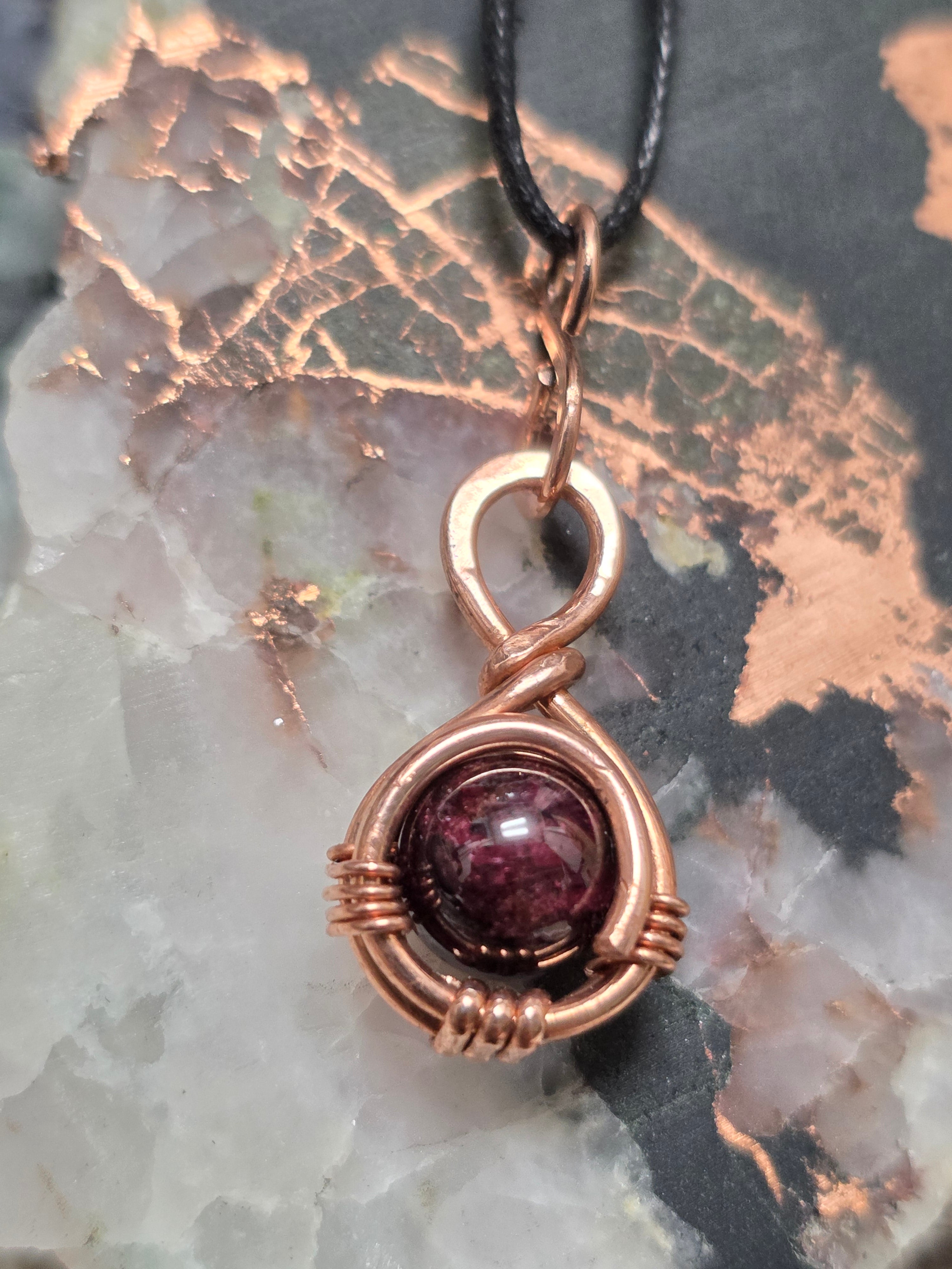 "Orbit" Garnet Pendant