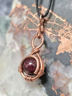 "Orbit" Garnet Pendant